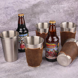 Stainless steel beer glass with engraved leather pint glass sleeve