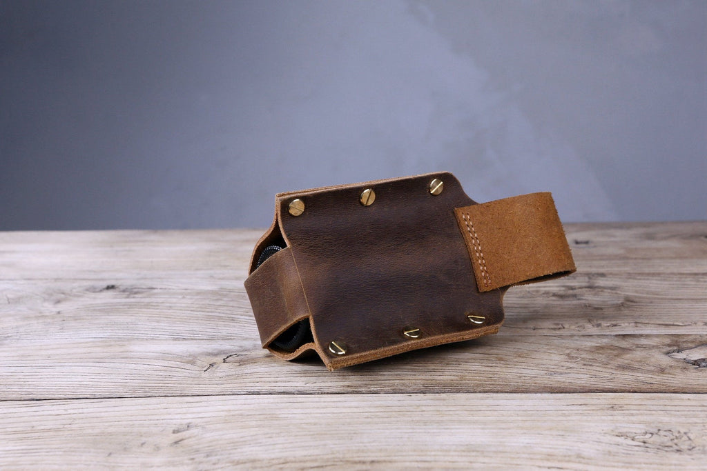 https://dmleatherstudio.com/cdn/shop/products/personalized-thick-full-grain-leather-beer-holster-539222_1024x1024.jpg?v=1696127769